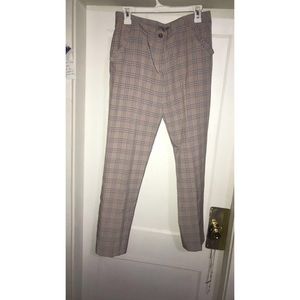 Form-fitting dress pants.